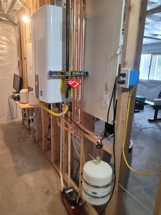 Licensed plumber repairing a kitchen sink in Bluffton